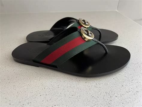 reversed Gucci Flip Flops